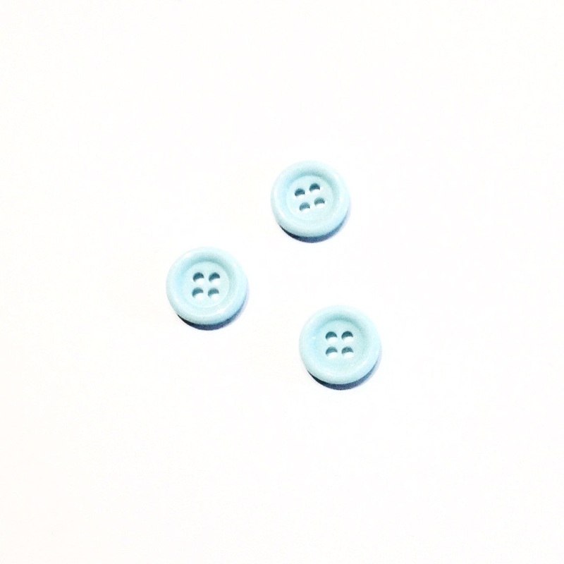 Four Holed Baby Blue Button-15 mm